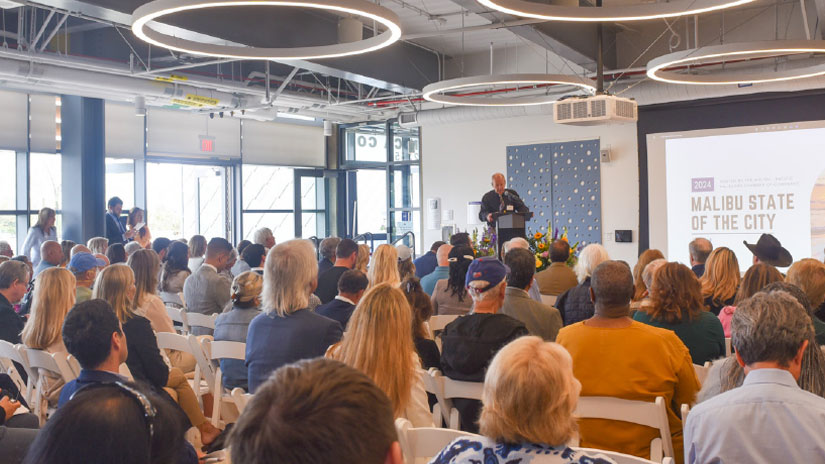 Malibu State of the City crowd mayor Steve Uhring on the podium.