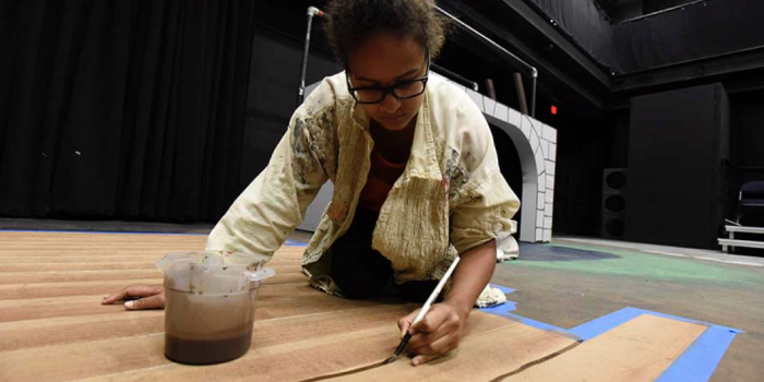 Picture of a student painting scenery