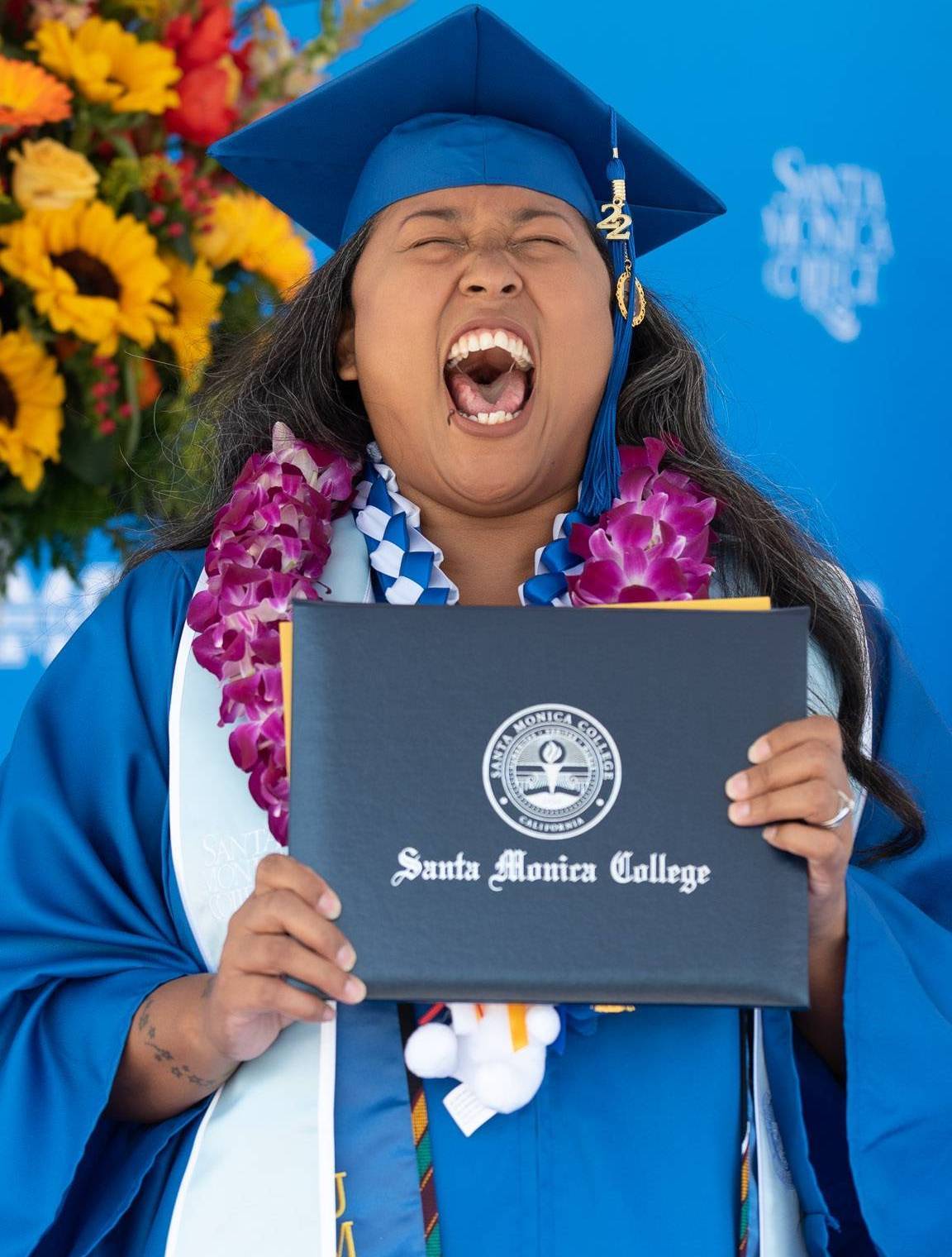 Lilian Guzman, who in addition to a colorful garland, wore a sash featuring the trademark stripes and logo of SMC’s Latino Center/Adelante Program, has a creative marketing internship lined up at Disney ABC thanks to SMC’s Promo Pathway Program