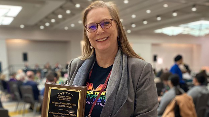 Nancy Grass accepting Model Communication Studies Program award